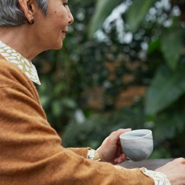 An older woman using a computer