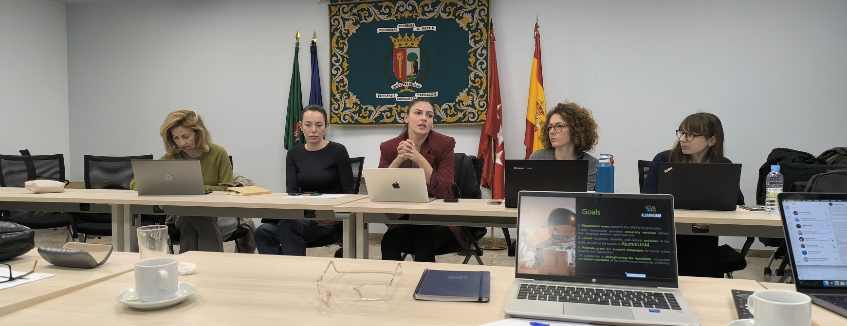 A group of people at a meeting.