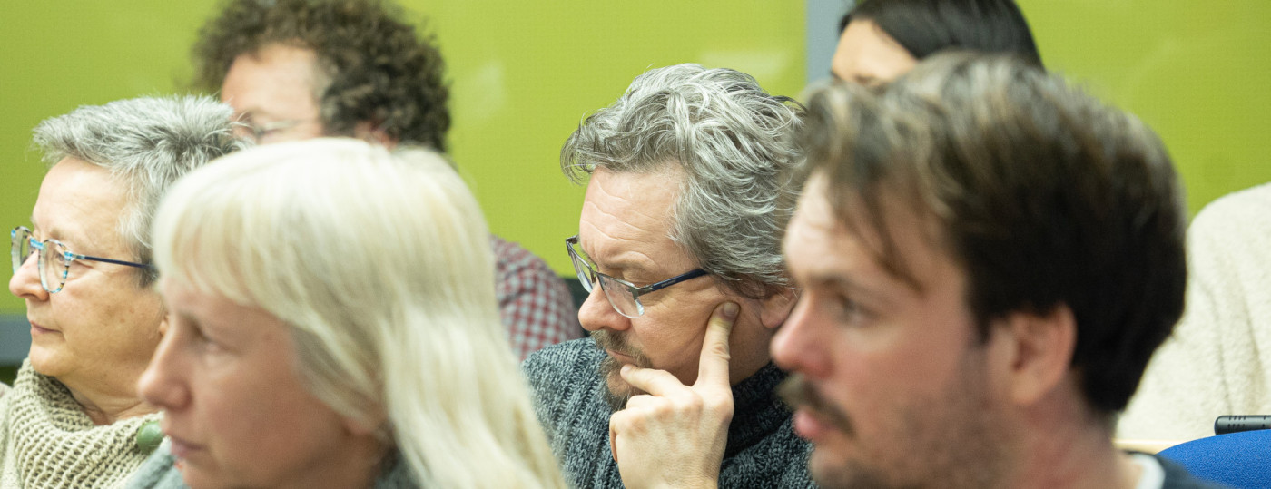 Alumni listening to a lecture.